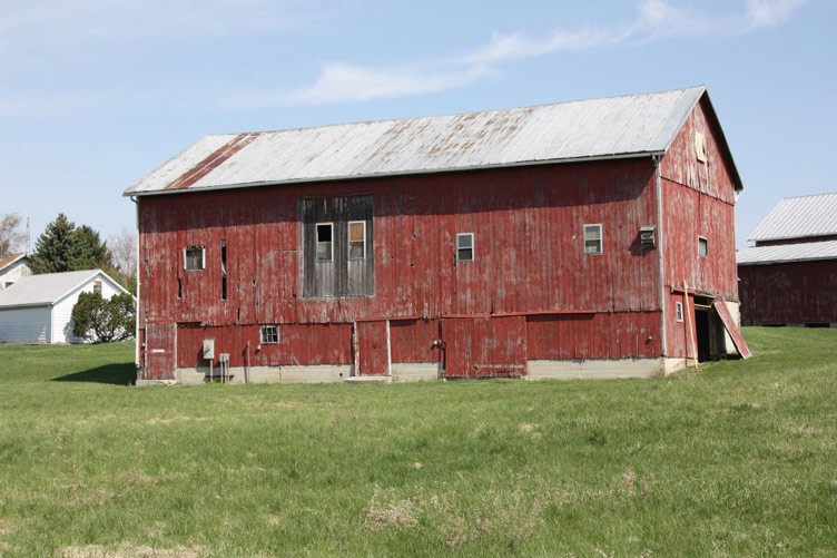 Old red barn before farmhouse renovation