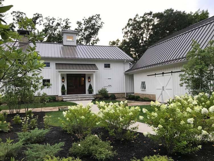 beautiful white barns after restoration