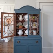 blue hutch with glass doors found by flea market shopping