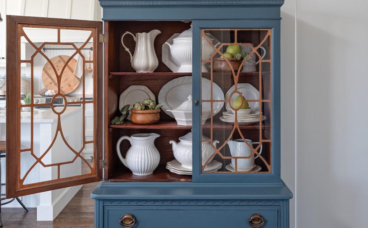 blue hutch with glass doors found by flea market shopping