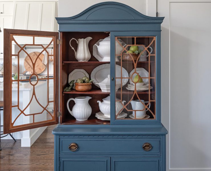 blue hutch with glass doors found by flea market shopping