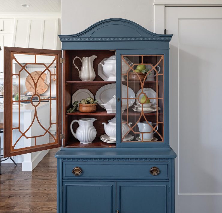 blue hutch with glass doors found by flea market shopping