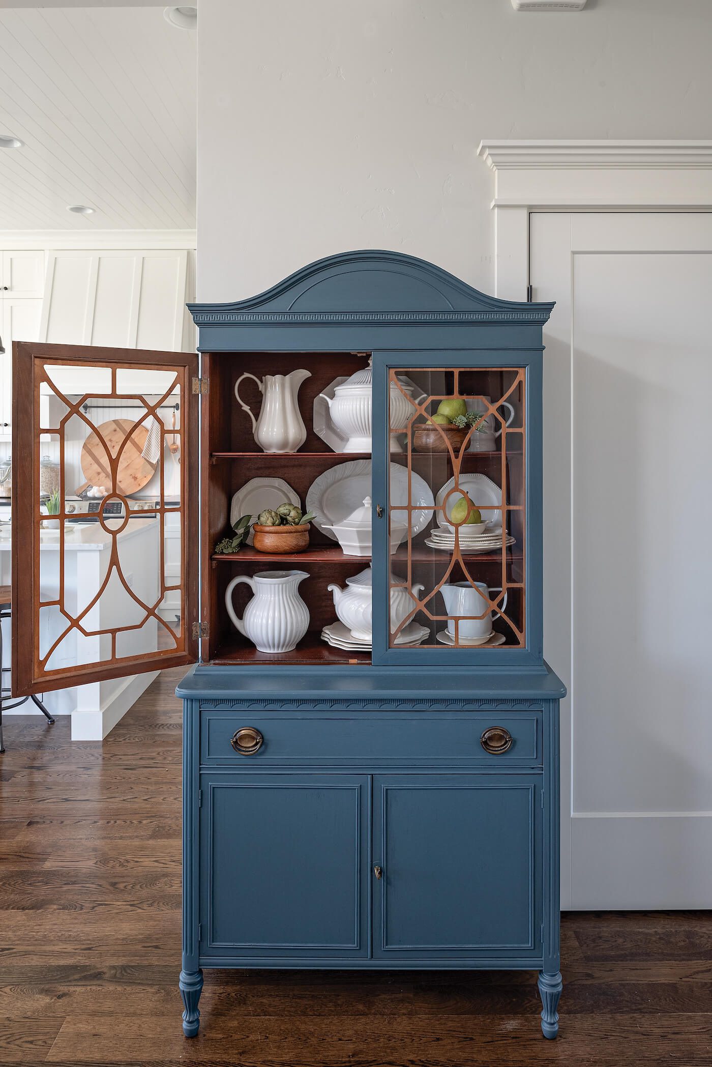 blue hutch with glass doors found by flea market shopping