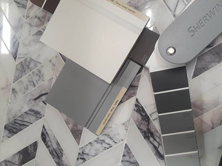 Gray tile and paint chips