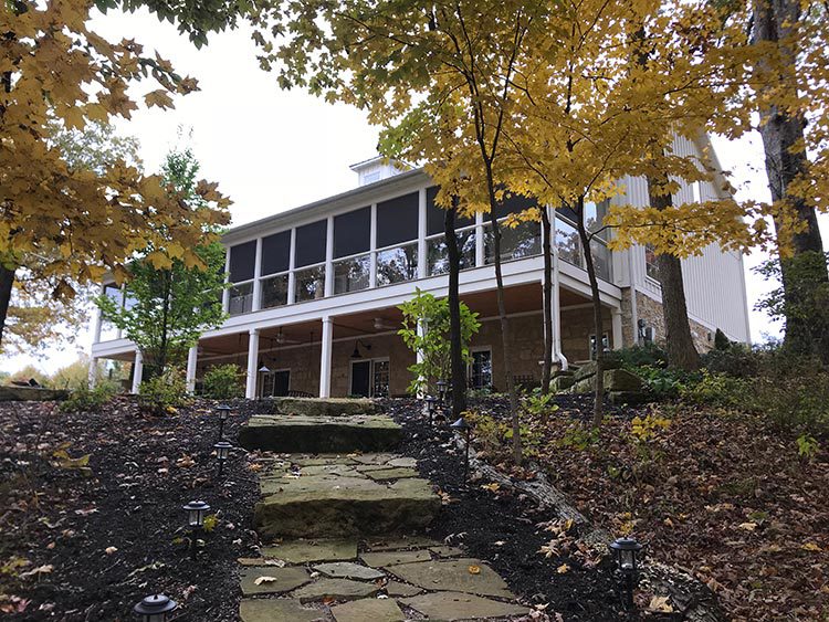 Farmhouse renovated barn exterior backyard