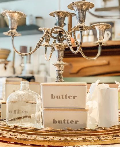 Antique chandelier and a collection of vintage items from Holly Thompson homes.