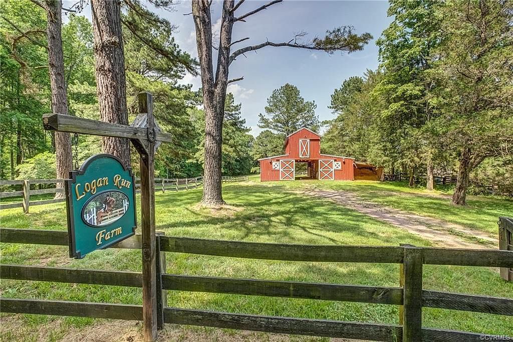 Logan Run, a horse farm with a red barn