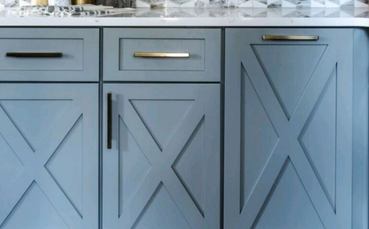 Ash grey cabinets with X wood carving