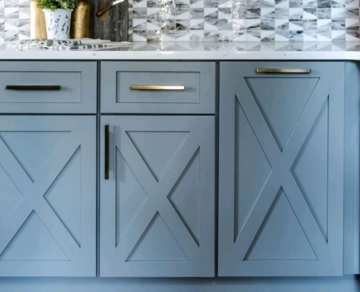 Ash grey cabinets with X wood carving