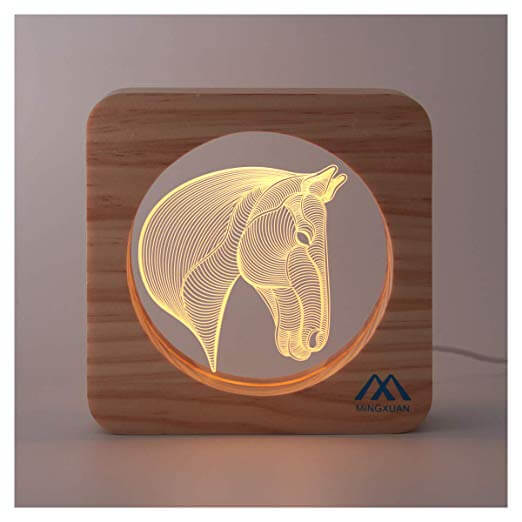 A night light complete with a glowing three-dimensional horse as the actual light source