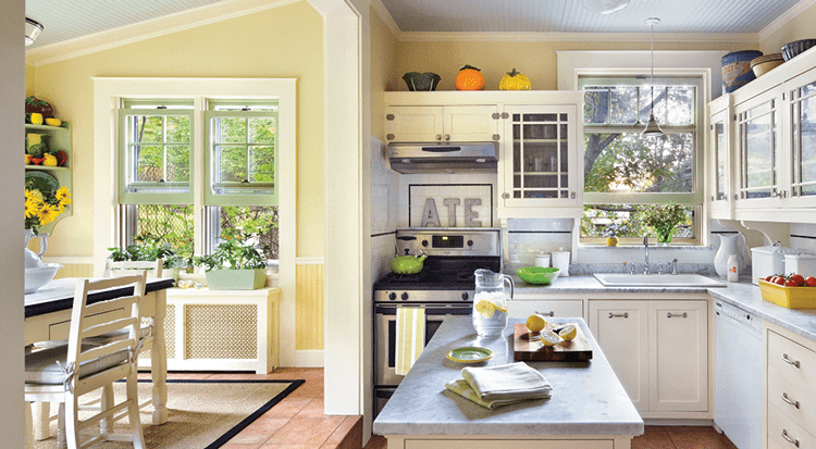 historic farmhouse kitchen with breakfast nook yellow walls