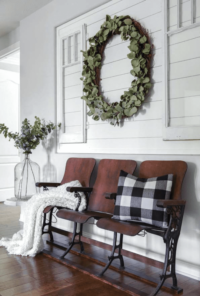 Vintage movie seats on the landing of a custom farmhouse for vintage farmhouse style