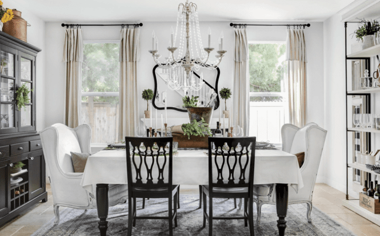 An elegant white dining room in a custom farmhouse