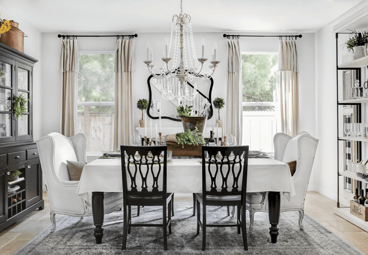 An elegant white dining room in a custom farmhouse