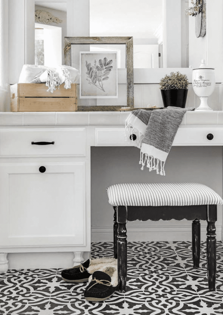 DIY black and white tile in a master bathroom in a custom farmhouse