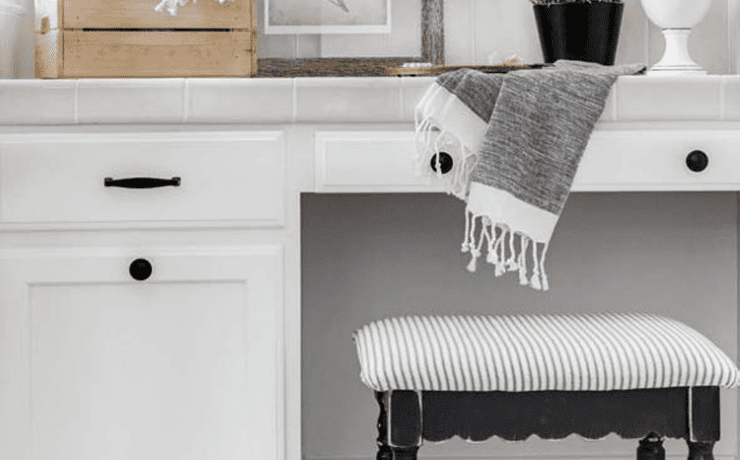 DIY black and white tile in a master bathroom in a custom farmhouse