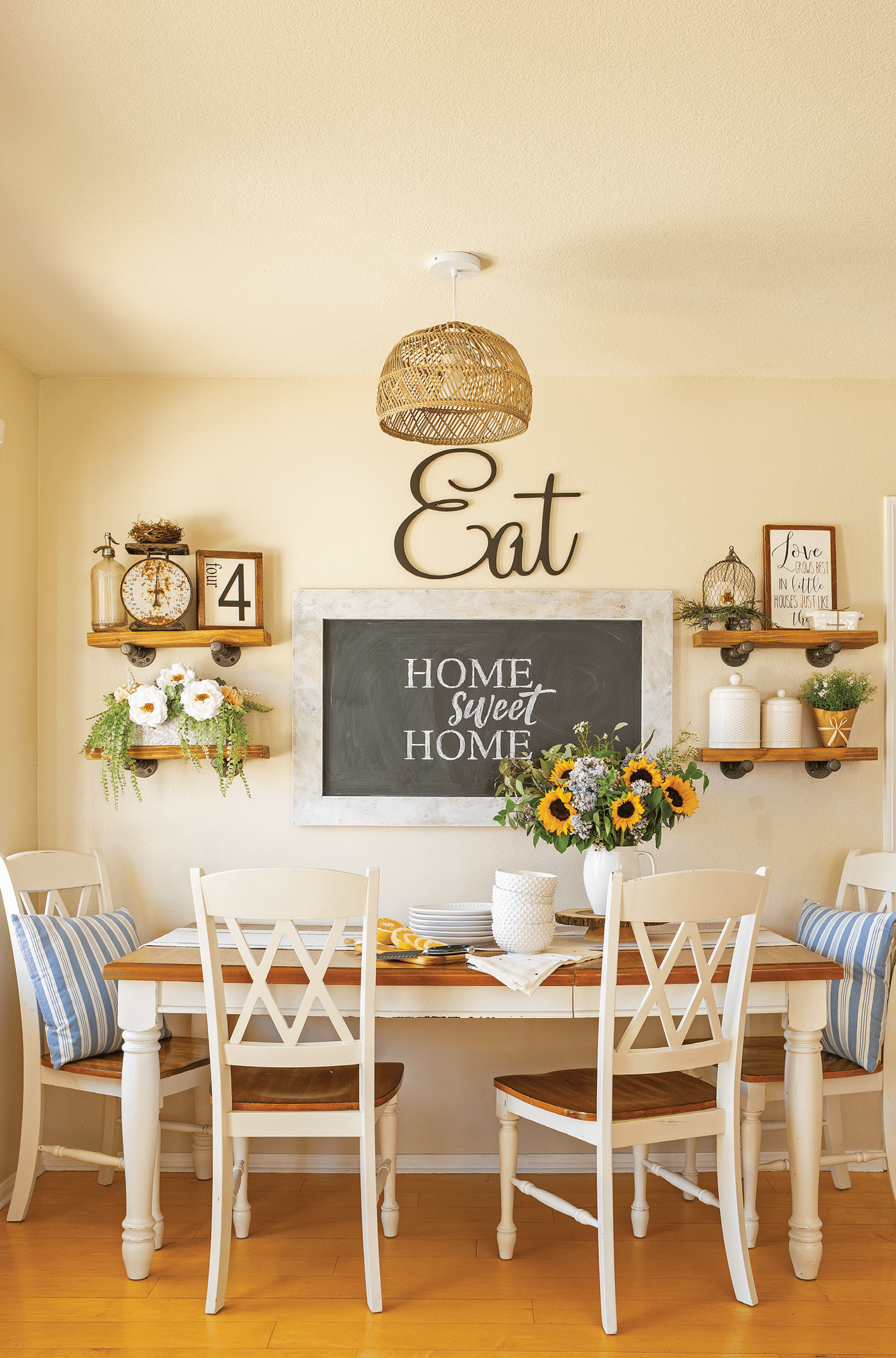Farmhouse dining room with gallery wall and farmhouse details.