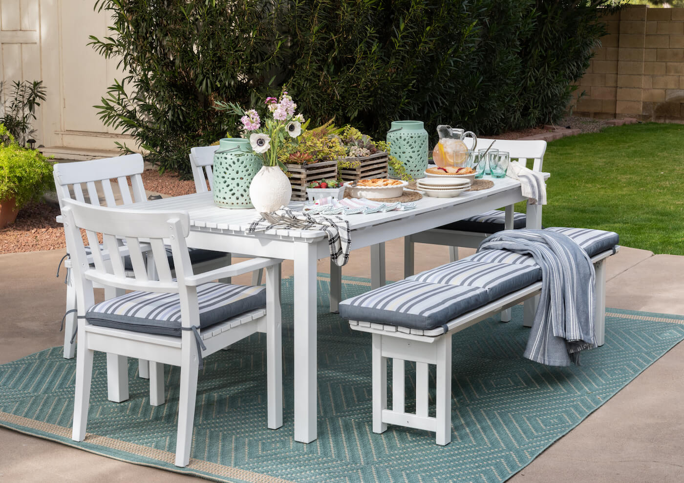 outdoor dinner party table with pies