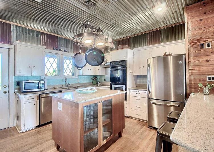 Corrugated metal appears in this ranch kitchen