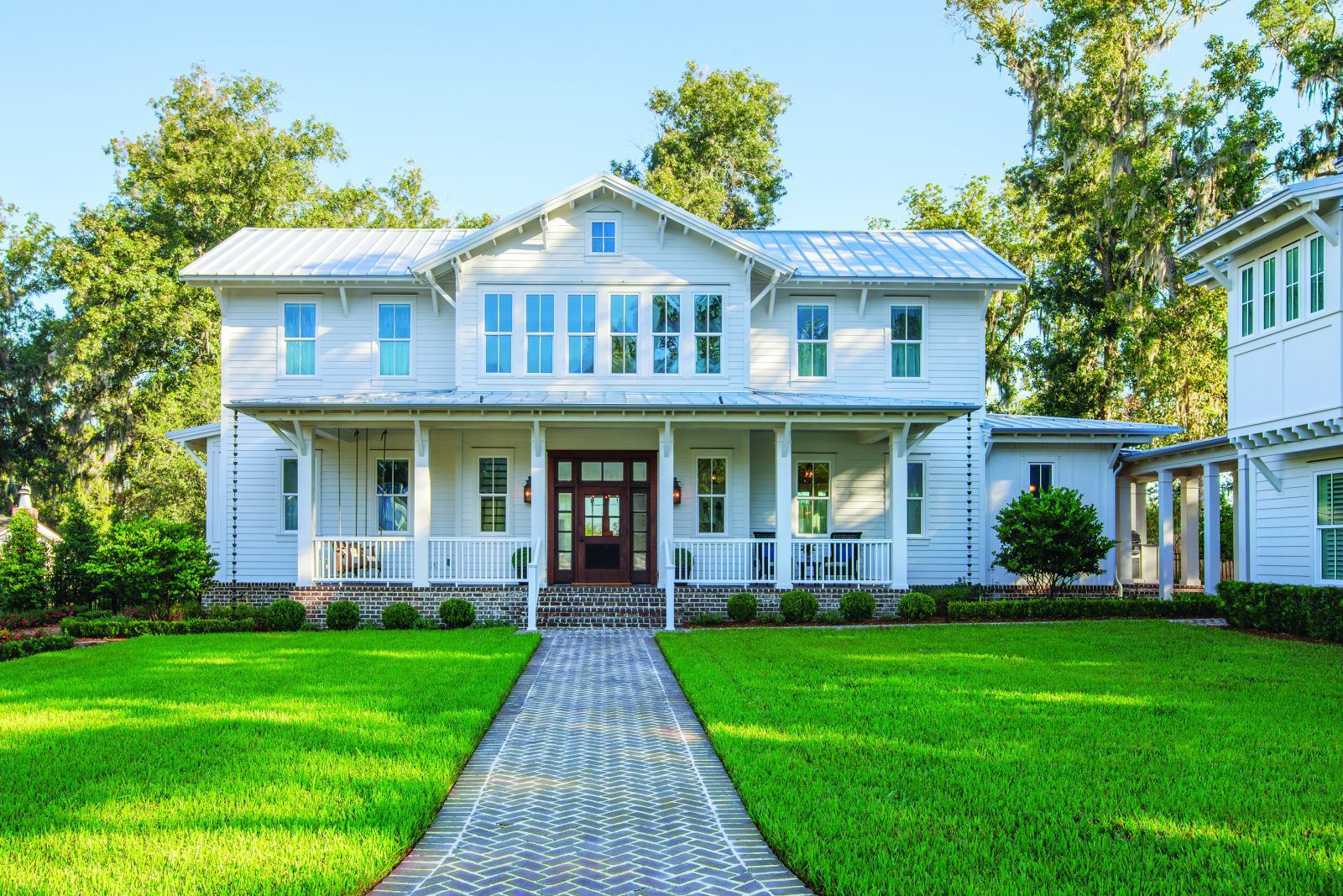 Exterior of custom farmhouse - choose the right builder