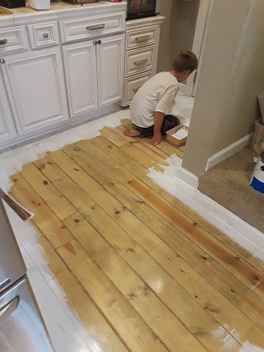 Even kids can help painting the floor.