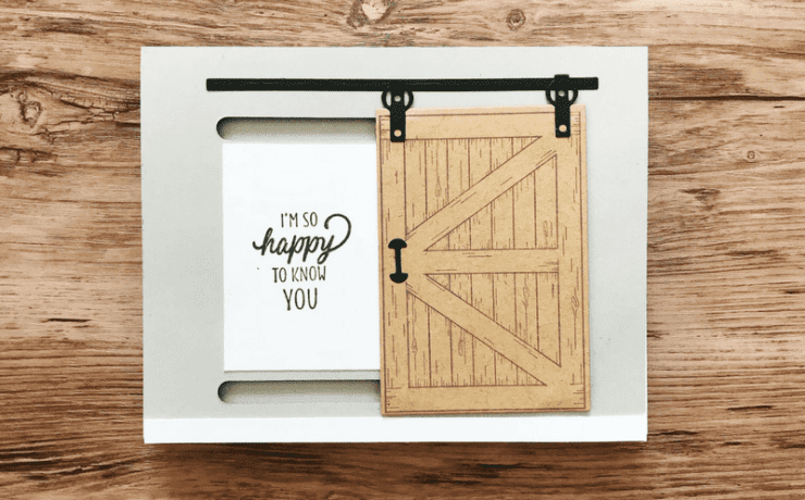 Birthday cards depicting a sliding barn door, with the words “I’m so happy to know you” depicted to the left of it