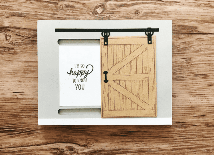 Birthday cards depicting a sliding barn door, with the words “I’m so happy to know you” depicted to the left of it