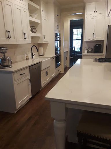 All-white kitchen with quartz countertops