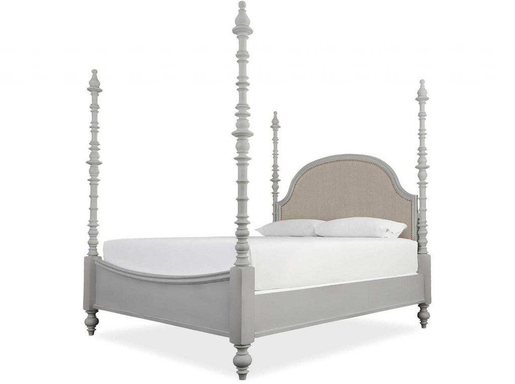 white four poster bed in french farmhouse style