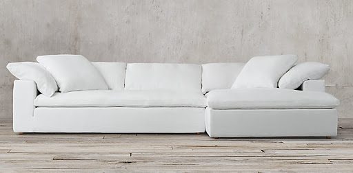 A large, white and comfy sectional