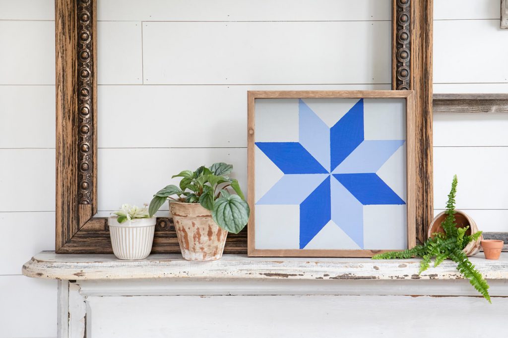 DIY barn quilt on mantel with houseplants