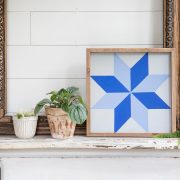DIY barn quilt on mantel with houseplants