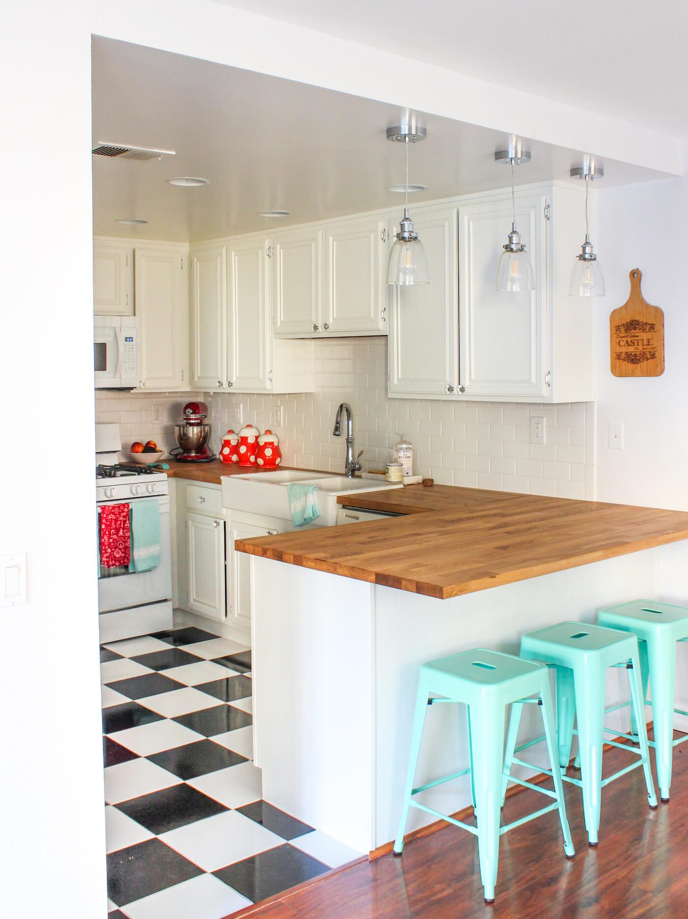 Repaint kitchen cabinets to white with farmhouse style