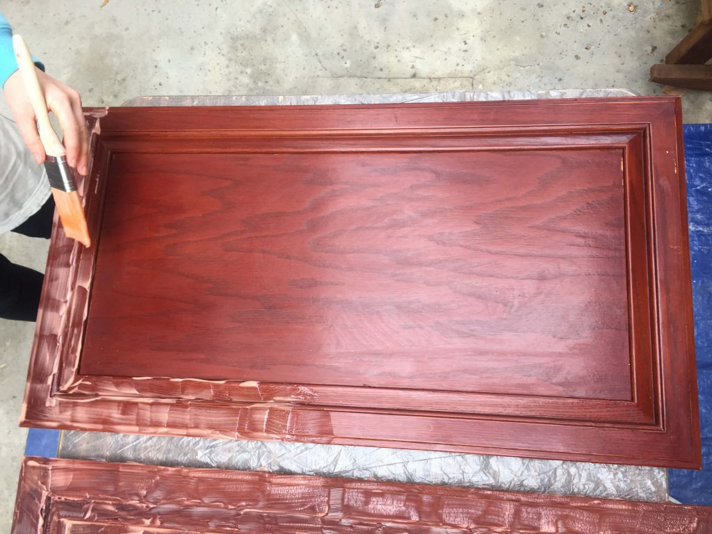 Stripping varnish off the cabinet doors