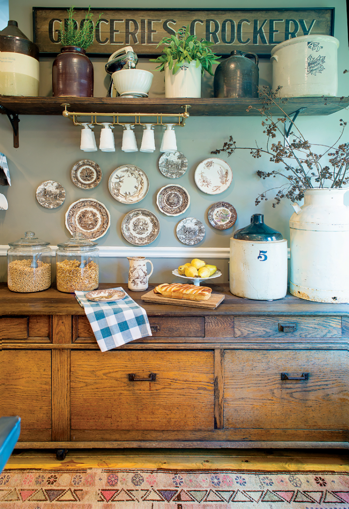 mercantile wall in mid century farmhouse kitchen with transferware