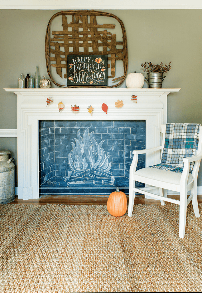 chalkboard fireplace with diy mantel in mid century farmhouse