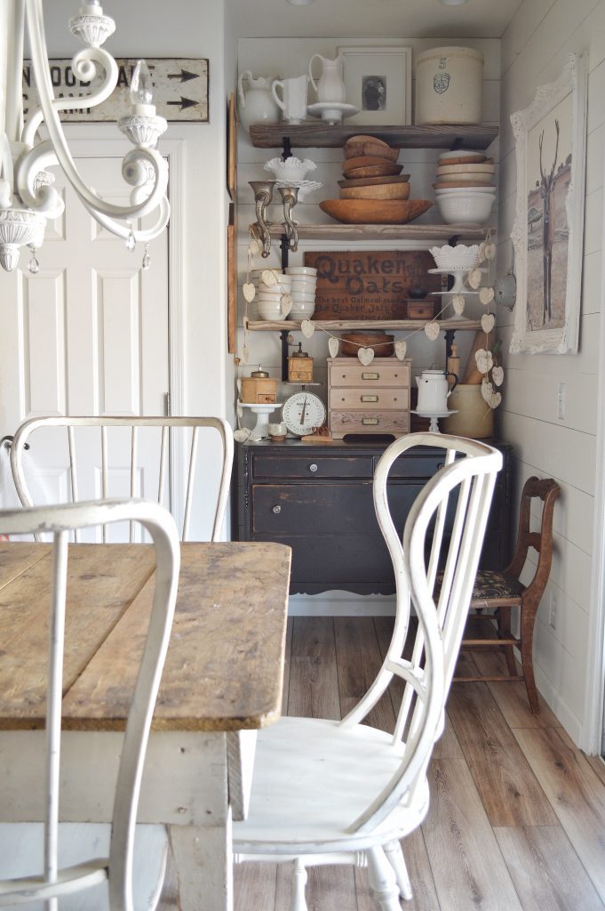 Kitchen of Natalie from My Vintage Porch with vintage bowls and furniture