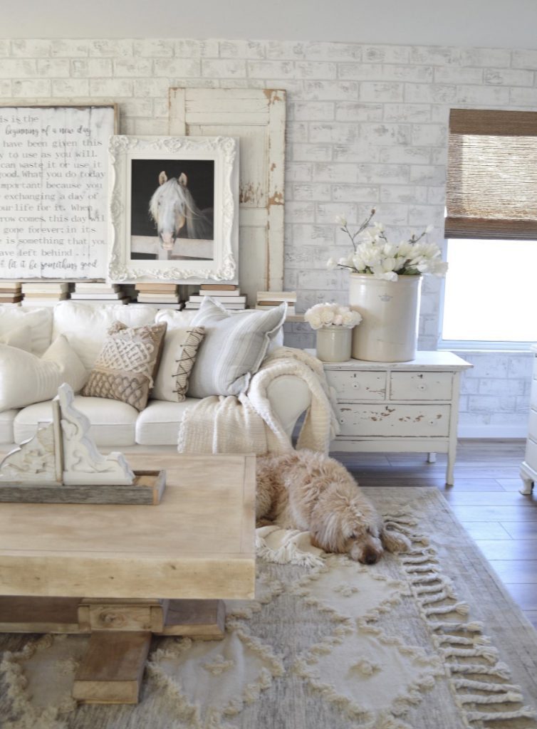 Living room with white interiors and horse painting