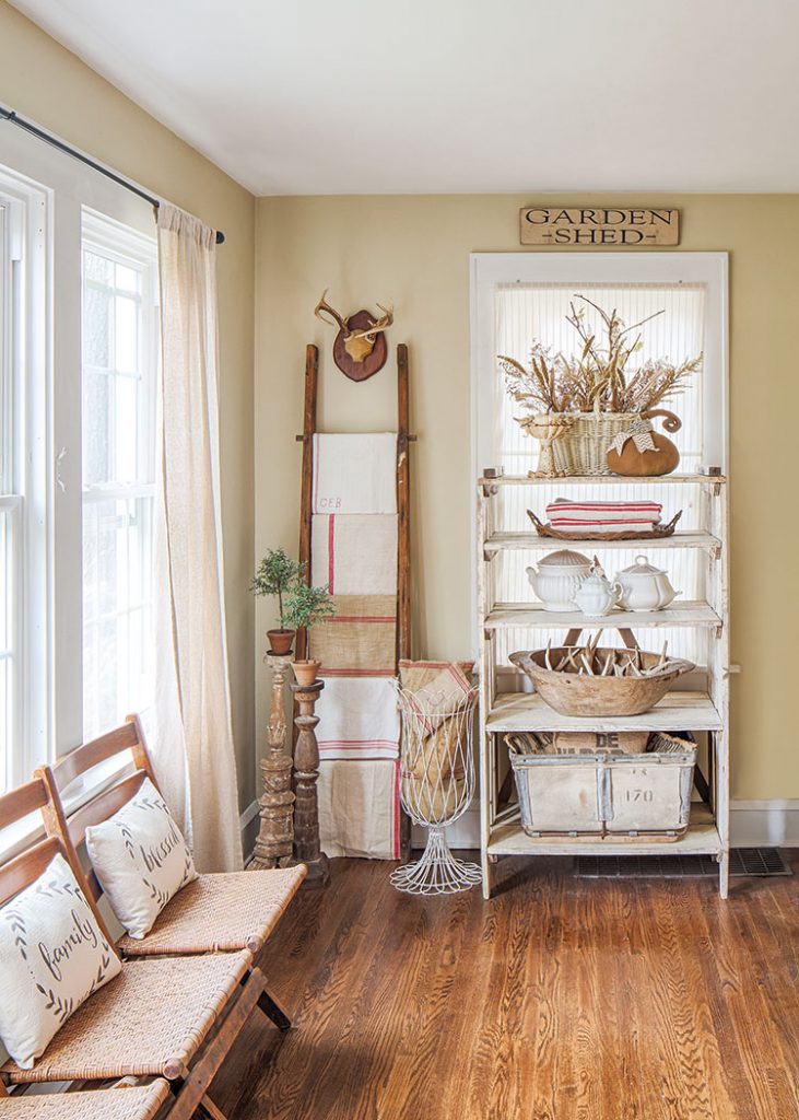 vintage chairs by window in flea market inspired farmhouse