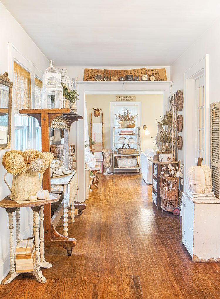 hallway with antiques in flea market inspired farmhouse