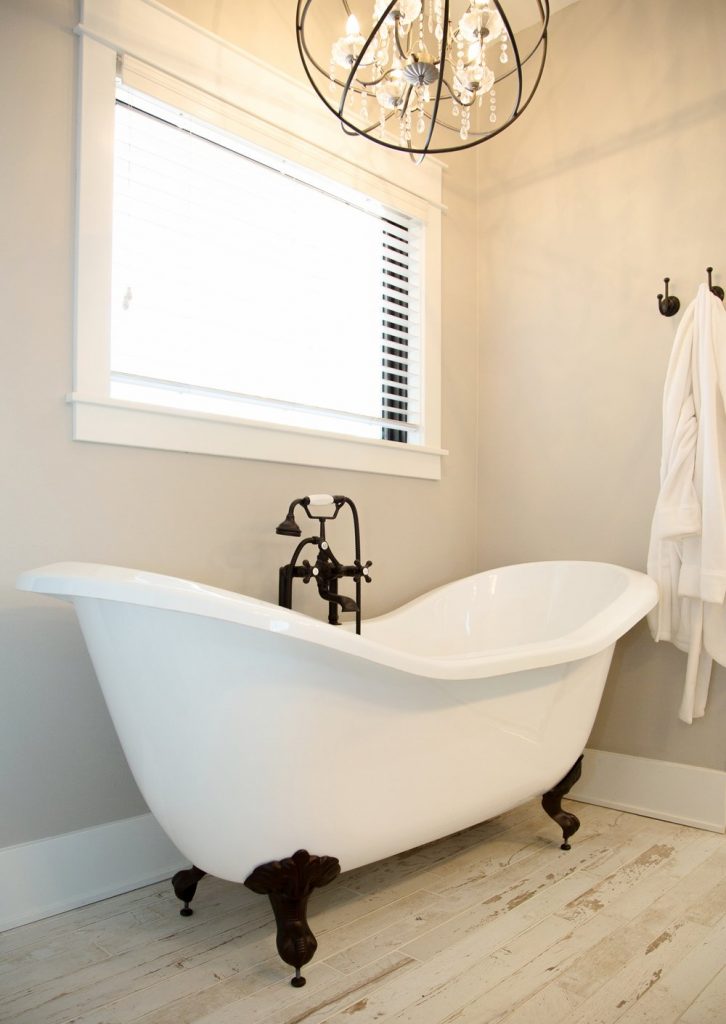 clawfoot bathtub in farmhouse bathroom