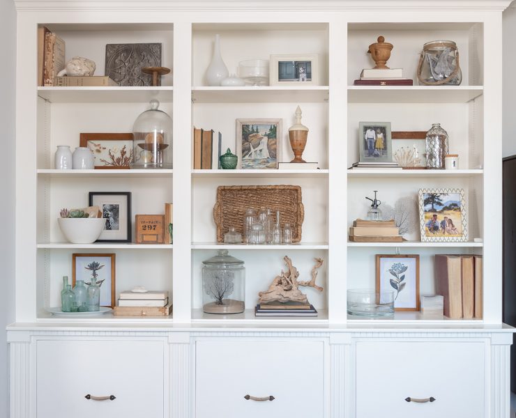 Built-in cabinets filled with decor