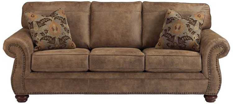 Light brown leather sofa with nail stud trim.