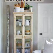 White hutch with sign art above