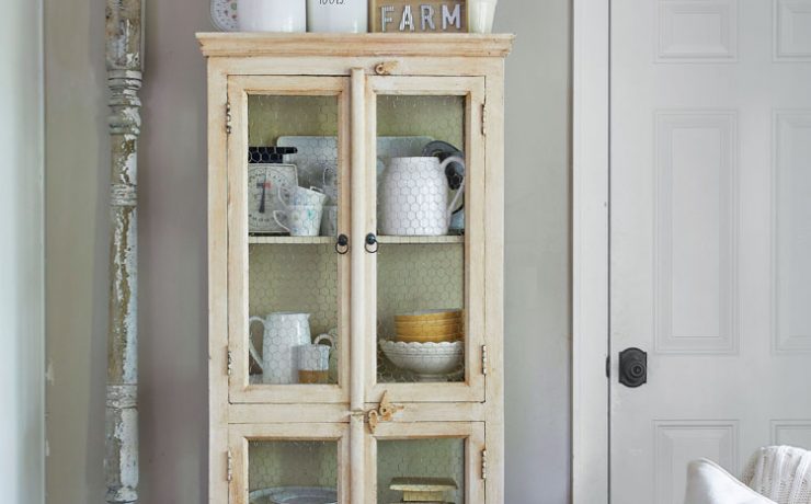 White hutch with sign art above