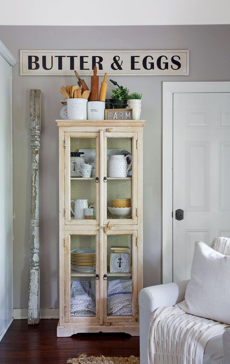 White hutch with sign art above