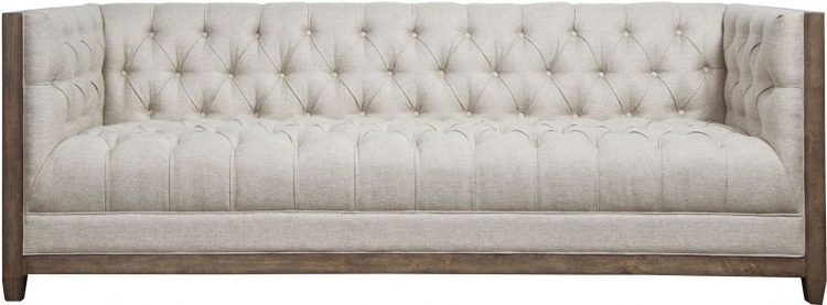 Off-white tufted fabric sofa with straight edges.