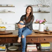 Soliel Moon Frye sits on her rustic farmhouse table