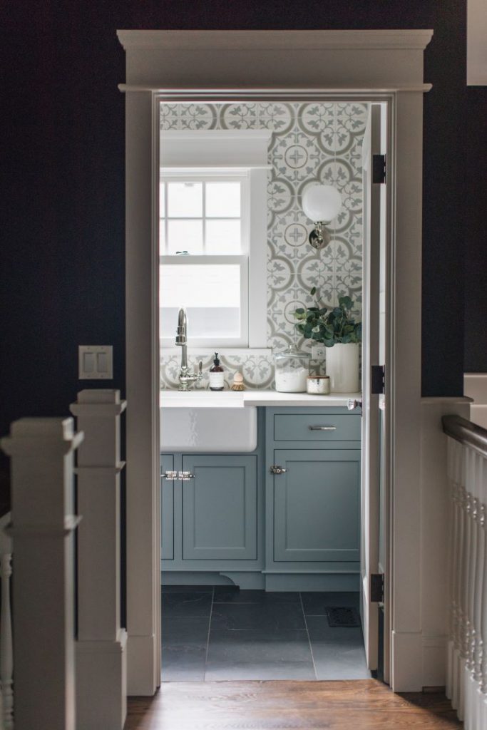 Door to blue laundry room