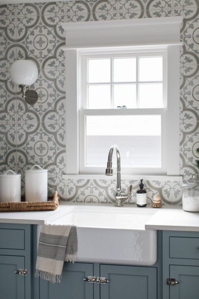 Blue counter and large white farmhouse sink